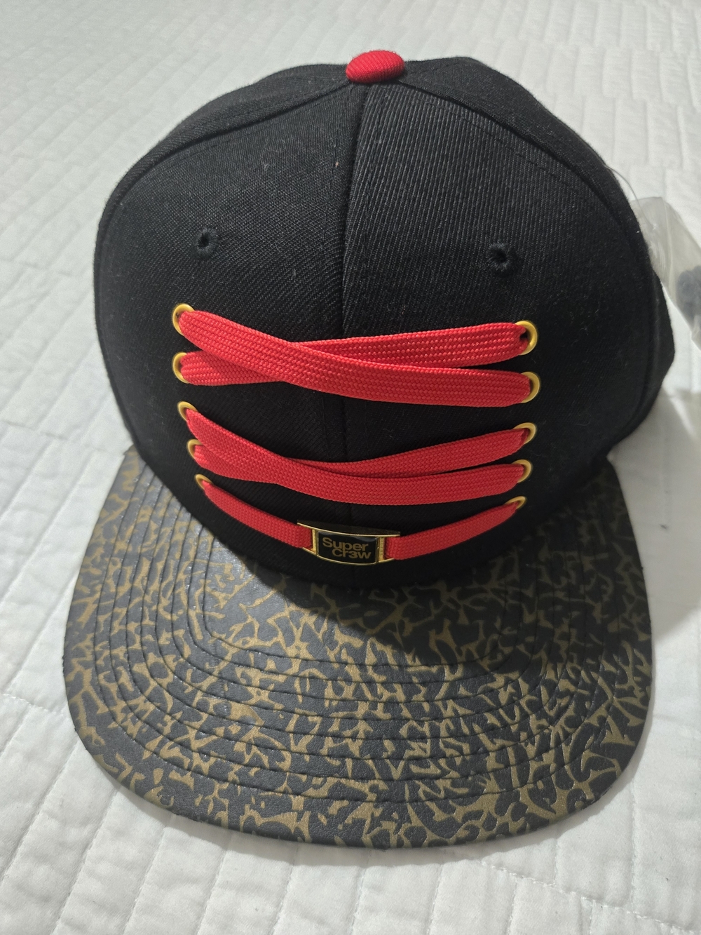 Black & Red Lace-Up Snapback Hat with Patterned Brim